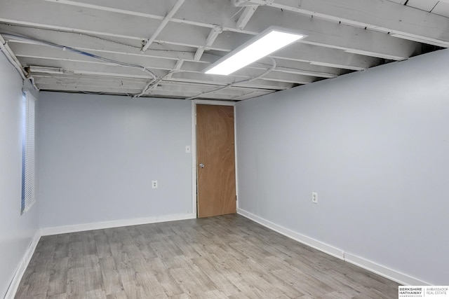 basement with light wood-type flooring