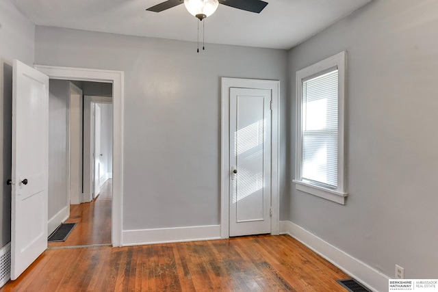 interior space featuring ceiling fan and hardwood / wood-style flooring