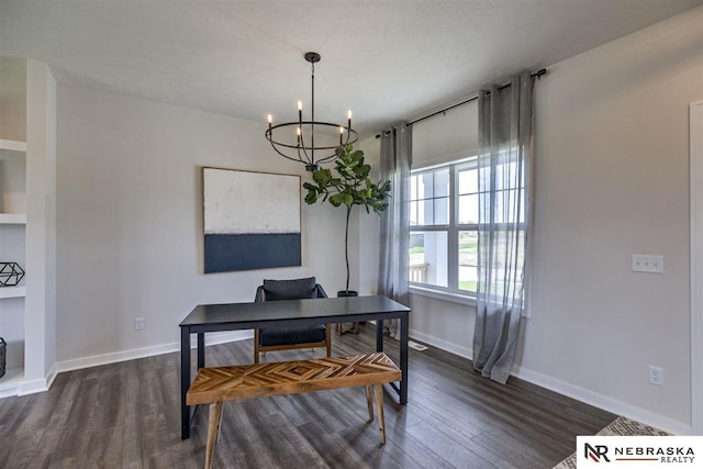 office space featuring dark hardwood / wood-style floors and a notable chandelier