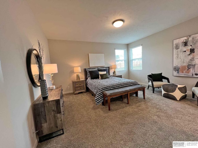 bedroom featuring light colored carpet