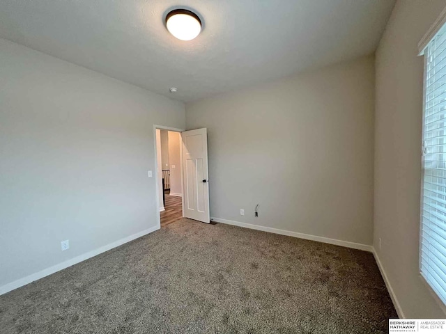 empty room with carpet floors