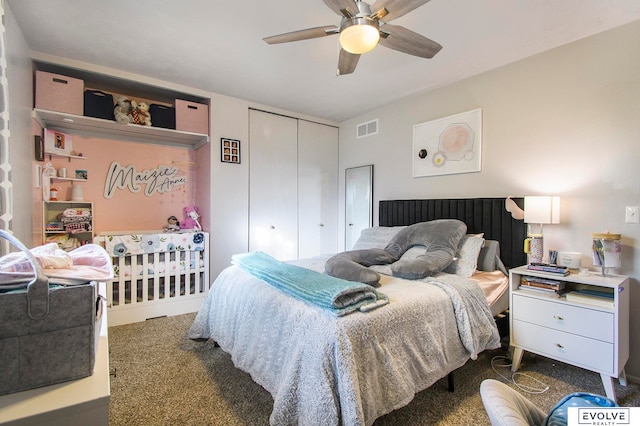 bedroom with ceiling fan and dark colored carpet