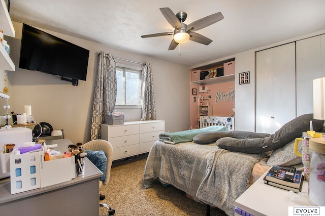 bedroom with ceiling fan and light carpet