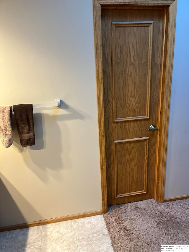 bathroom featuring tile patterned flooring