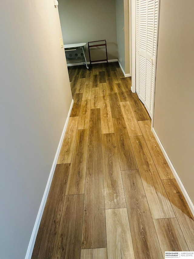 hallway featuring hardwood / wood-style floors