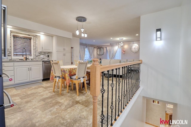 dining space with sink