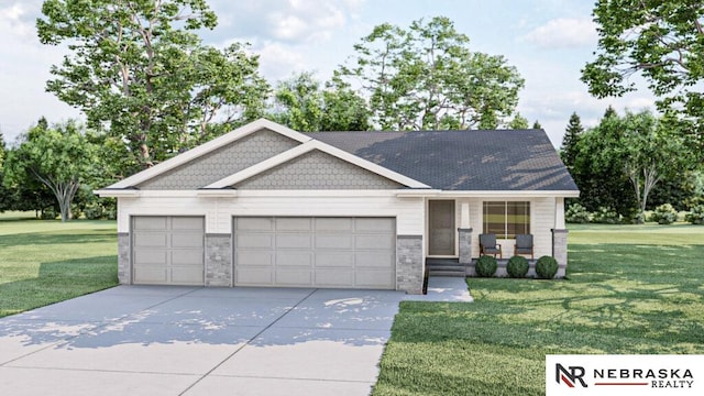 view of front of property with a garage and a front lawn