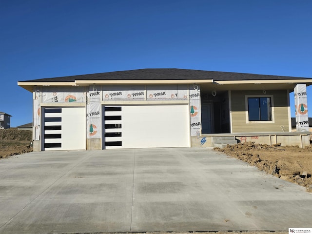 view of front of property featuring a garage