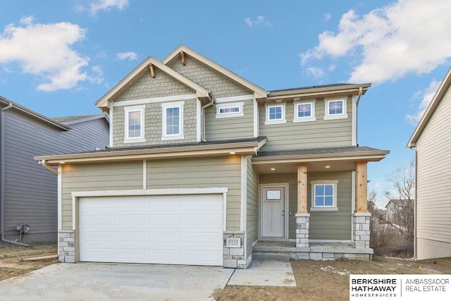 craftsman-style home featuring a garage