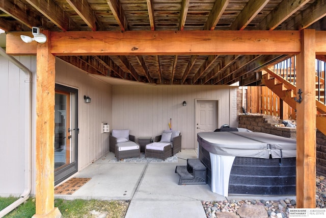 view of patio / terrace featuring a hot tub