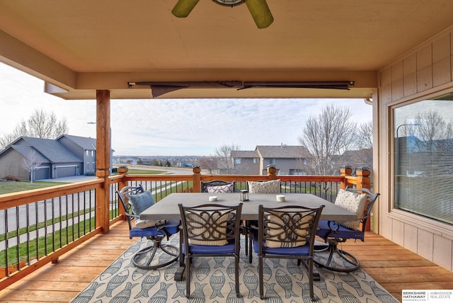 wooden terrace featuring ceiling fan