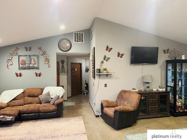 living room with vaulted ceiling