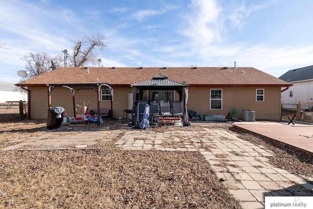 back of house featuring a gazebo, central AC, and a patio area