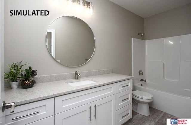 full bathroom with shower / tub combination, vanity, wood-type flooring, and toilet