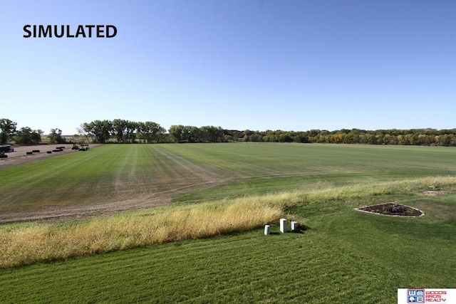 view of home's community with a yard