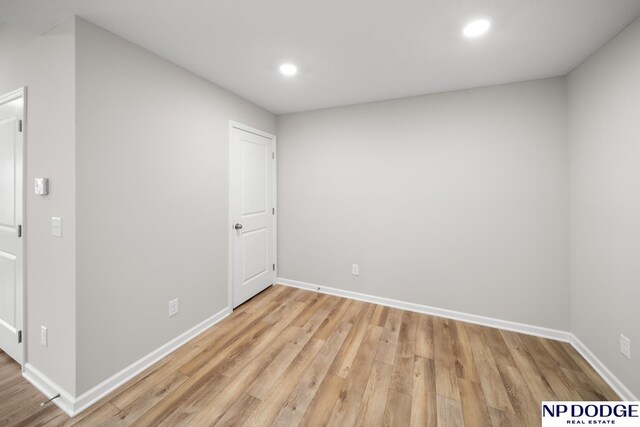 empty room with light wood-type flooring