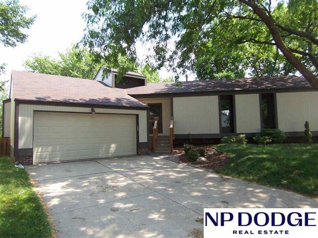 2729 N 129th Cir, Omaha, NE 68164 - view of front facade with concrete driveway and an attached garage