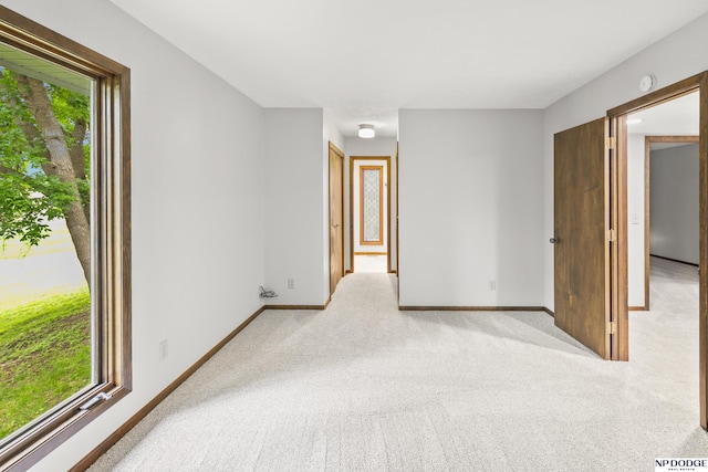 2729 N 129th Cir, Omaha, NE 68164 - empty room with light colored carpet, baseboards, and a smoke detector