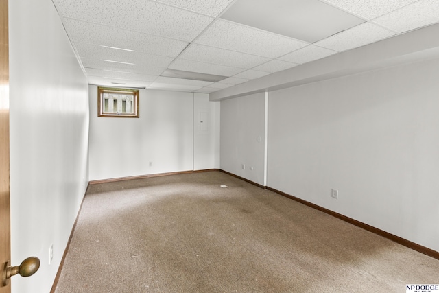 2729 N 129th Cir, Omaha, NE 68164 - unfurnished room with a paneled ceiling, carpet, and baseboards