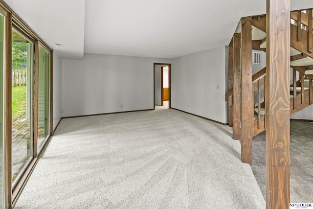 2729 N 129th Cir, Omaha, NE 68164 - unfurnished room with stairway, carpet floors, and baseboards