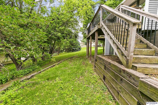 2729 N 129th Cir, Omaha, NE 68164 - view of grassy yard featuring a wooden deck and stairway