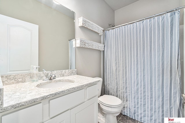 bathroom with tile patterned flooring, vanity, toilet, and a shower with shower curtain