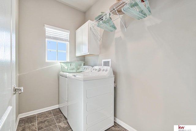 laundry area featuring cabinets and independent washer and dryer