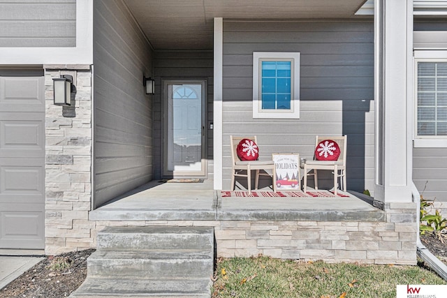 property entrance with covered porch