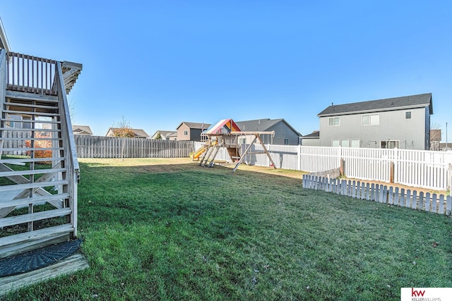 view of yard featuring a playground