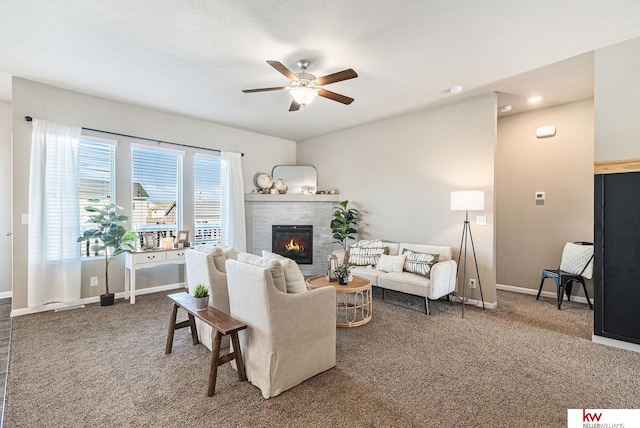 living room featuring ceiling fan and carpet