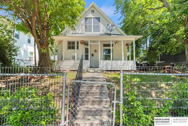 view of front of property featuring covered porch