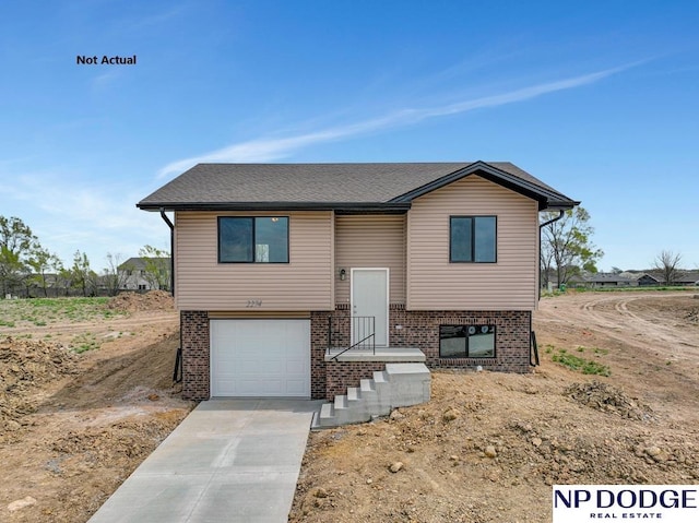 split foyer home featuring a garage