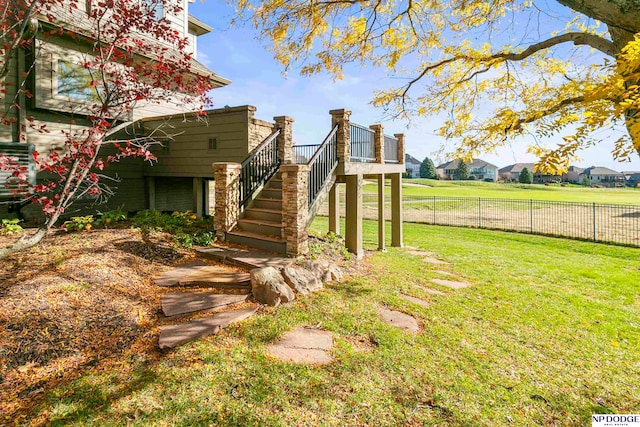 view of yard with a wooden deck