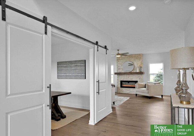 hall with light hardwood / wood-style floors