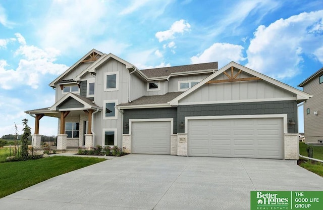 craftsman-style house featuring covered porch and a garage