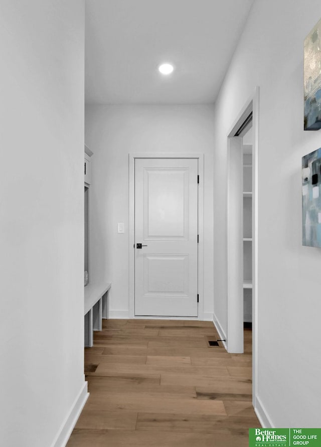 hallway featuring light hardwood / wood-style floors