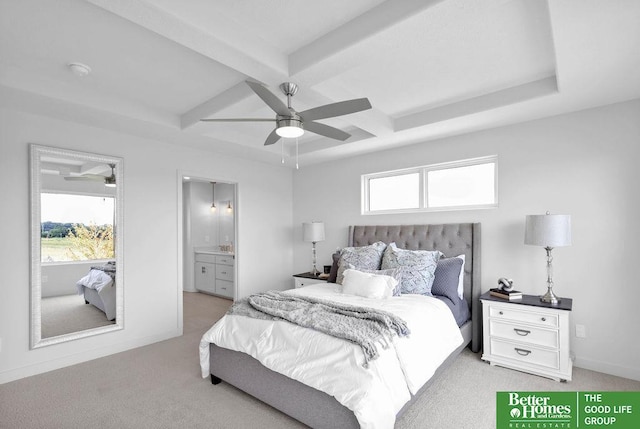 bedroom with ensuite bathroom, ceiling fan, light colored carpet, and multiple windows