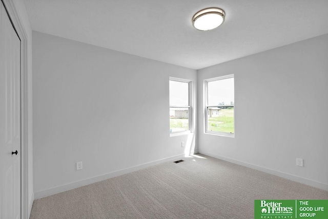 view of carpeted spare room