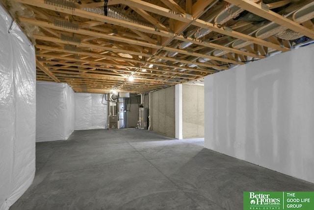 basement with heating unit and water heater