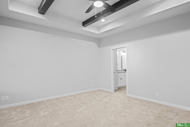 unfurnished room featuring light carpet, ceiling fan, and beamed ceiling