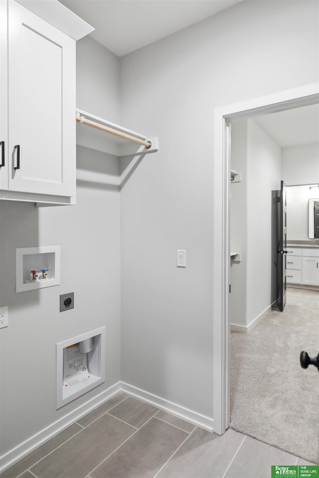 clothes washing area with carpet flooring, hookup for a washing machine, cabinets, and hookup for an electric dryer