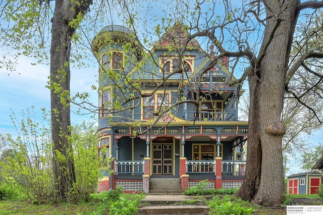 victorian-style house with a porch