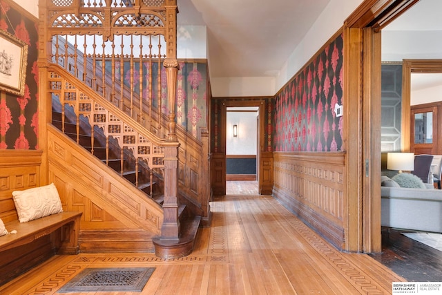 stairs with wood-type flooring