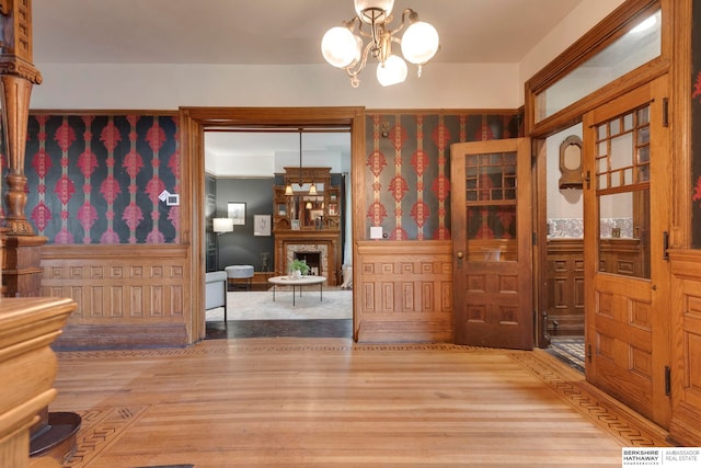 dining room featuring hardwood / wood-style flooring and a notable chandelier