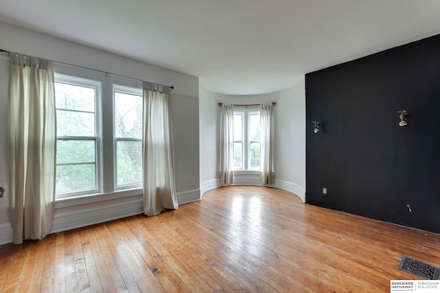 empty room with light wood-type flooring