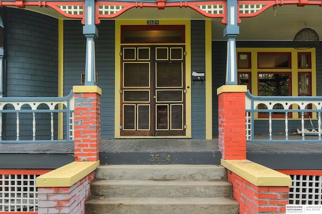 entrance to property with a porch