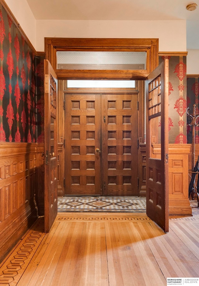 foyer entrance featuring hardwood / wood-style floors