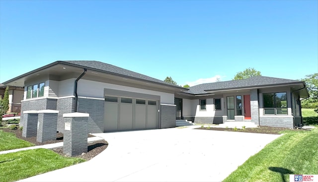 prairie-style home with a garage