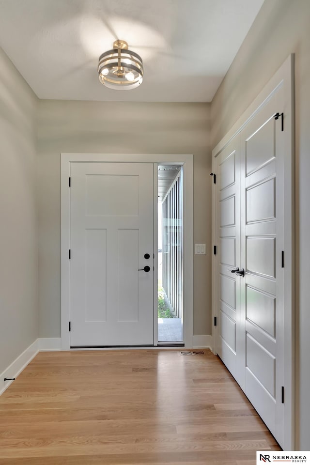 foyer featuring light hardwood / wood-style flooring