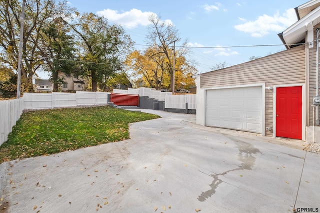 view of yard featuring a garage